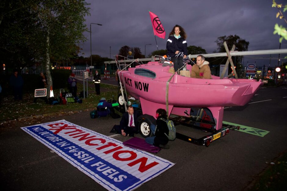 Pink boat blocks the entrance to ExxonMobil