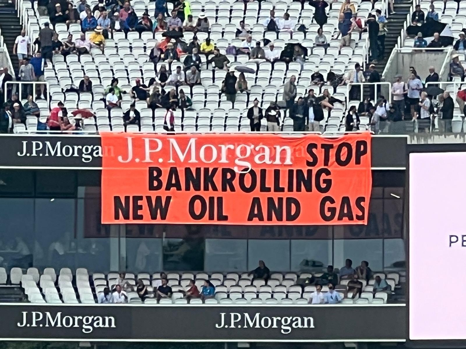 BREAKING: Doctors for XR drop banner at Lords reading ‘JP Morgan: Stop Bankrolling New Oil and Gas’