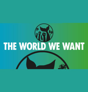 The World We Want: text in front of a logo with a a circle with a human fist, a whale's tail, a dog's paw, a bee, a hoof, and a couple of plants, on top of a green background